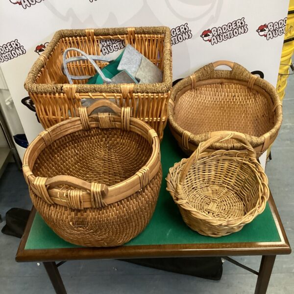 Vintage wicker baskets in varying sizes, ideal for storage or display.