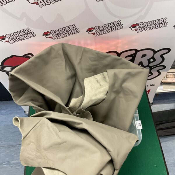 Two whole cow hides displaying natural leather texture.