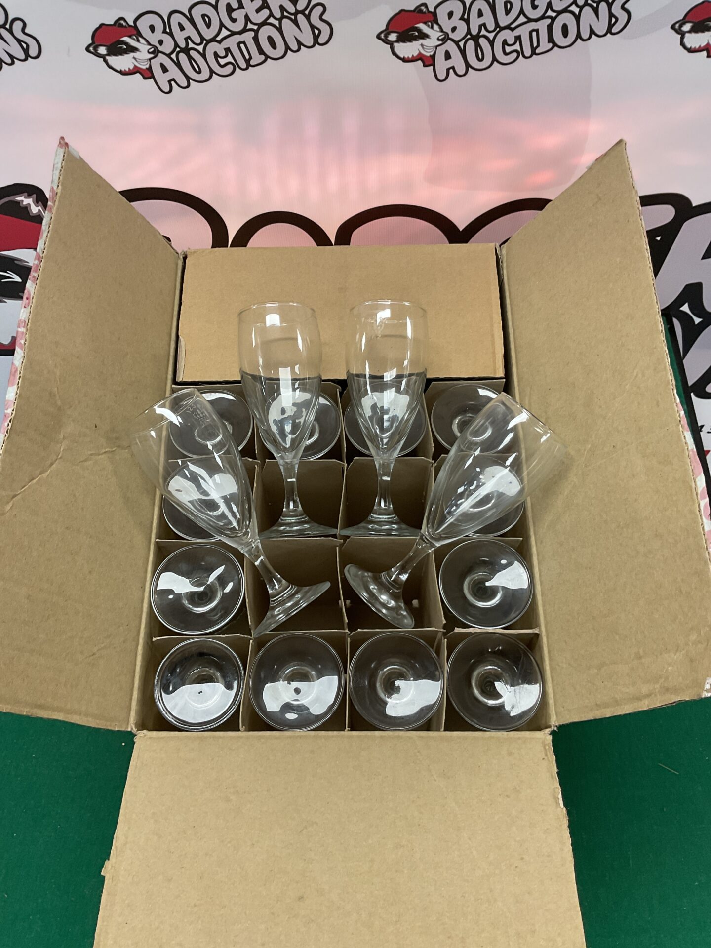 319 Box of ravenhead glass flute goblets