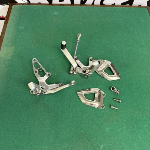 Triumph Speed Triple pedals set for motorcycle foot controls.