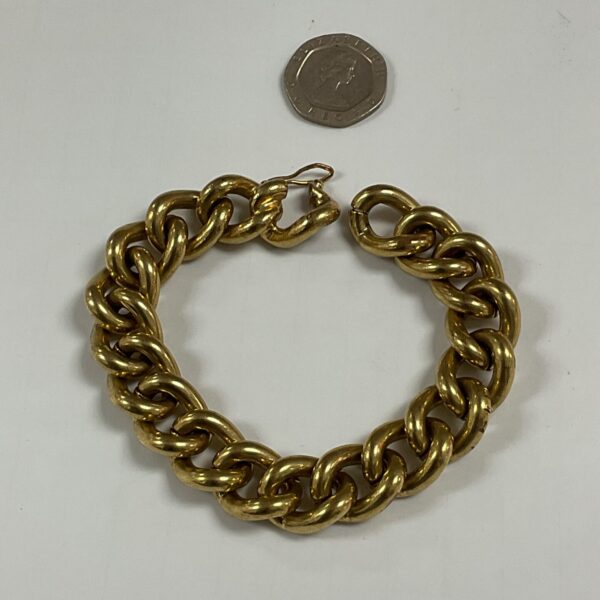 Heavy gold curb chain bracelet, classic vintage jewellery.