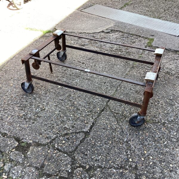 Side view of a heavy-duty pool table trolley jack.
