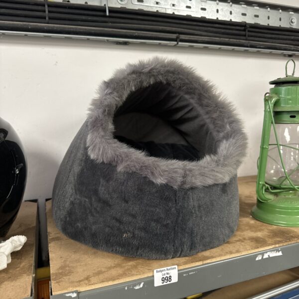 Soft plush pet hide bed for cats and small dogs.