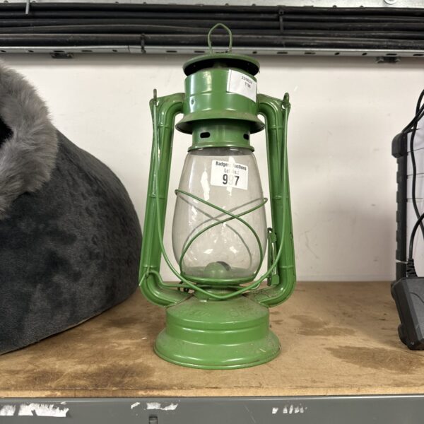 Vintage green Meva paraffin lamp, model 119, for camping or display.