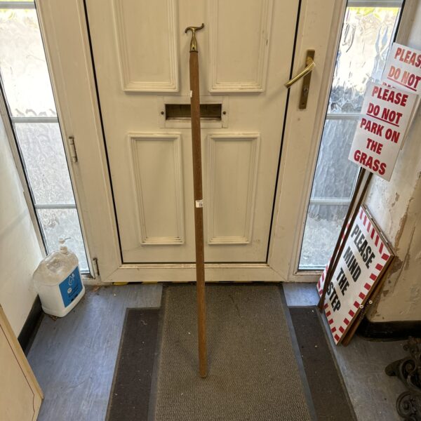 Vintage brass topped window pull bar for sash windows.