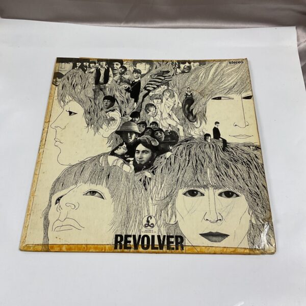 Beatles Revolver vinyl record cover, vintage stereo LP.