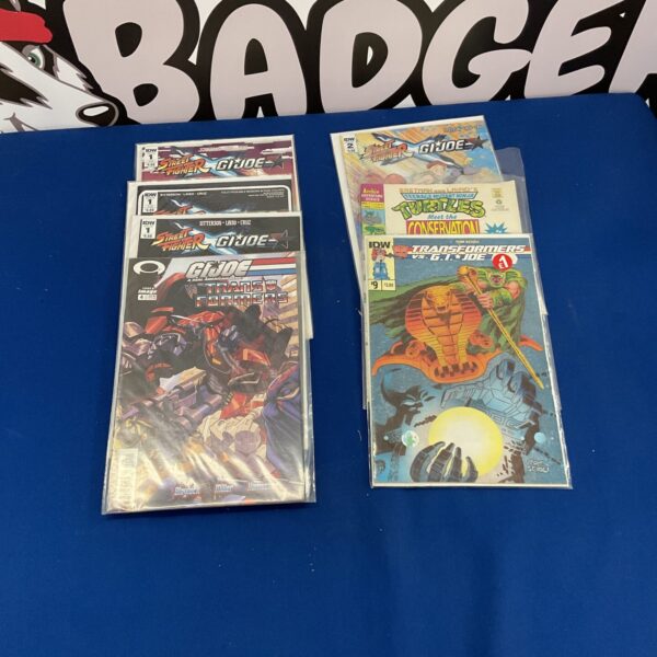 Vintage comic book lot featuring GI Joe, Transformers, and TMNT comics.