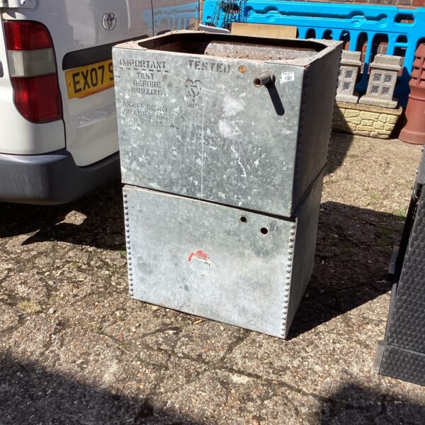 Vintage galvanised water tank for farm or garden use.