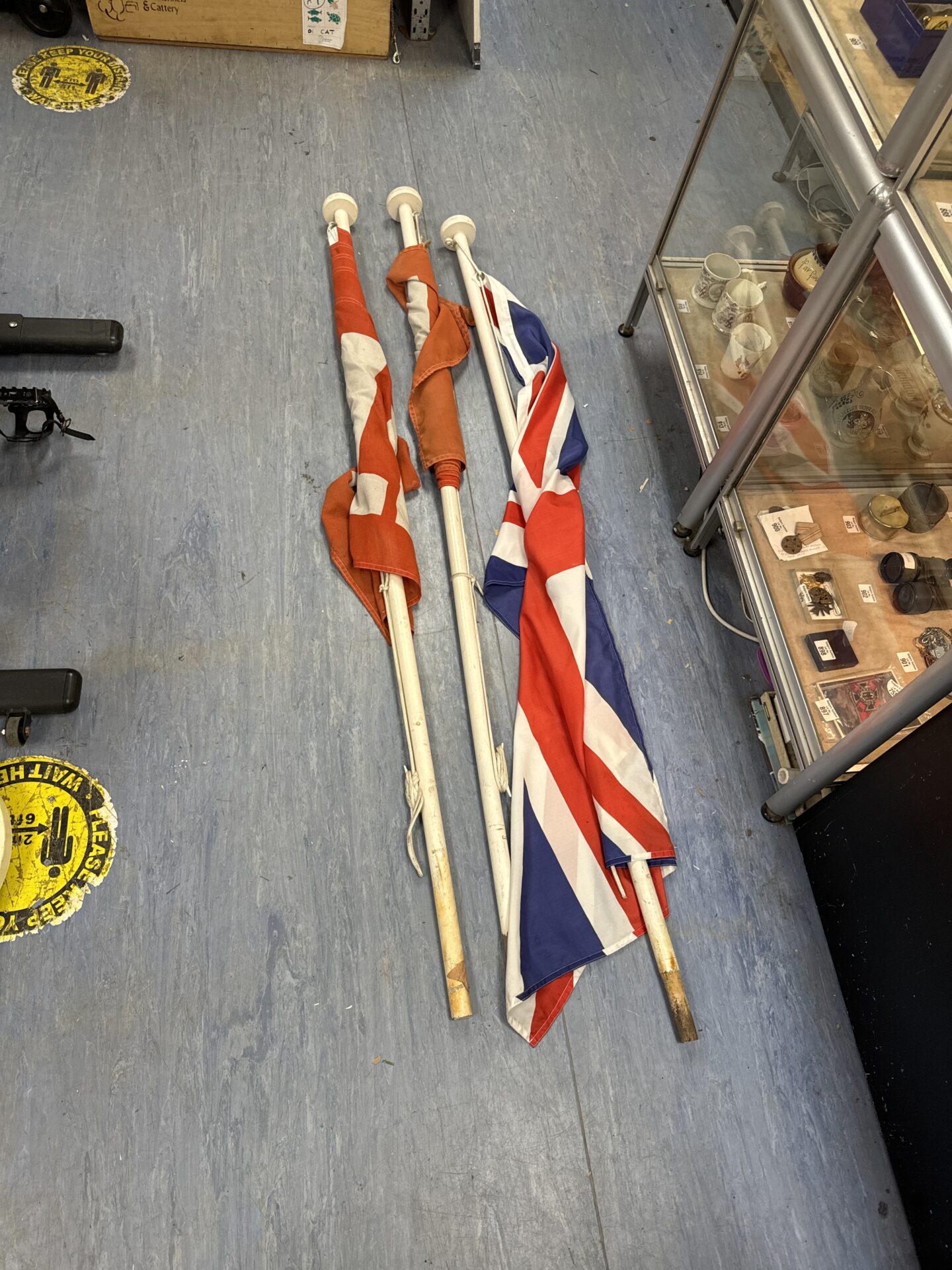 723 Two “sale” flags with a Union Jack flag – poles 72” length approx