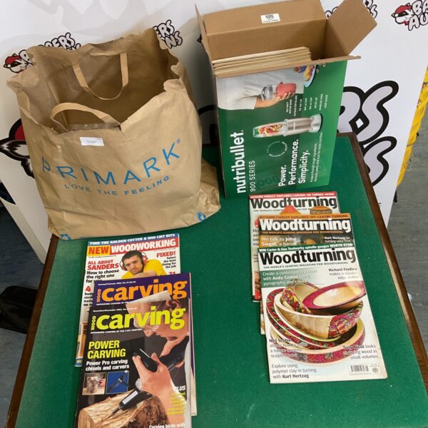 Stack of vintage woodworking magazines, including woodturning titles.