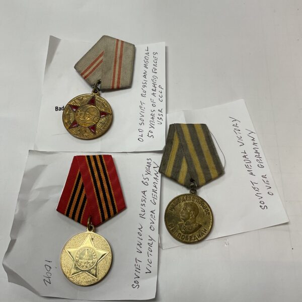 Lot of three Soviet Russian medals with ribbons.