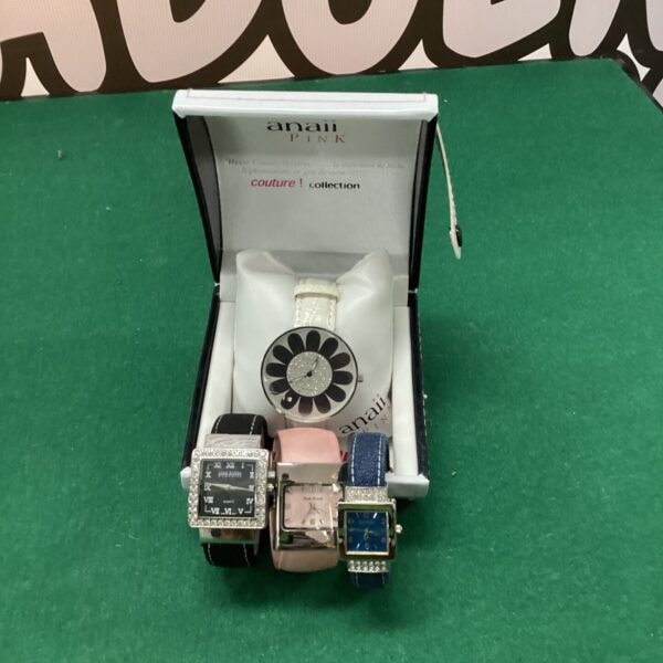 Close-up of an Anaii pink watch with a magnetic strap.