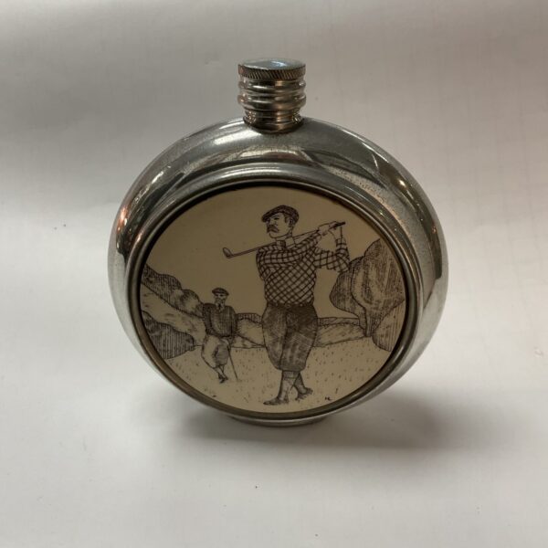 Vintage golf hip flask with golfers engraving.