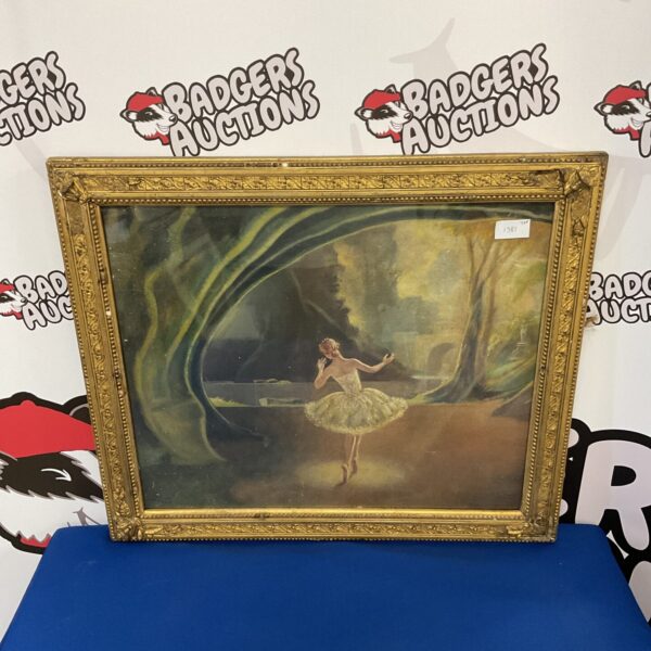 Vintage oil painting of a ballerina in a gilt frame.