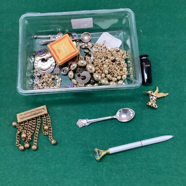 Mixed lot of vintage costume jewellery and a scent bottle.