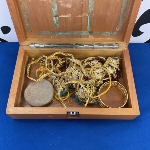 Close-up of a colourful lot of Indian jewellery.