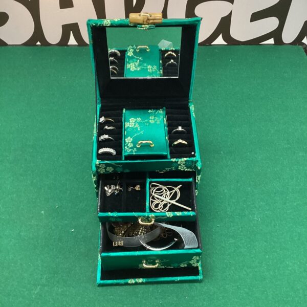 Patterned M&S oriental jewellery box with contents.