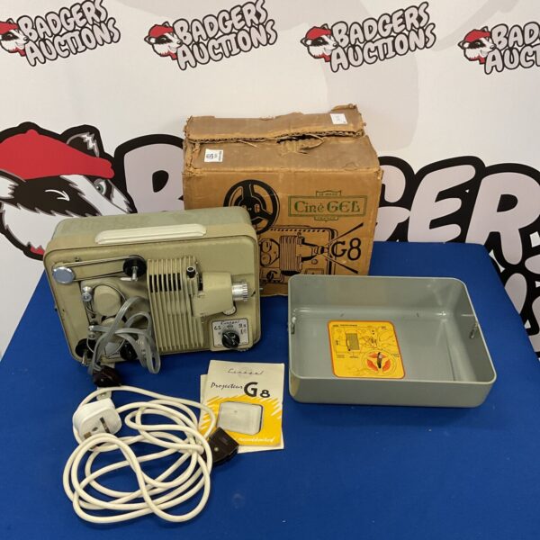 Vintage Cine Gee G8 8mm film projector for home movies.
