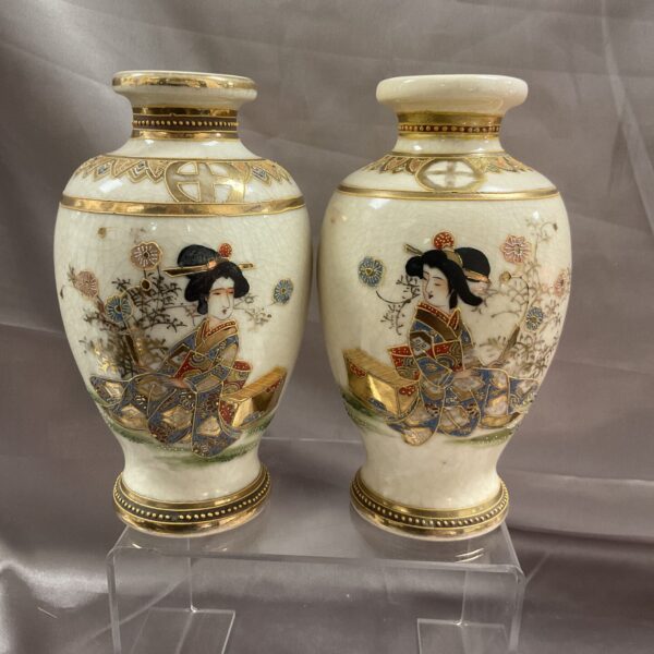 Pair of antique Japanese Satsuma vases with hand-painted figures.