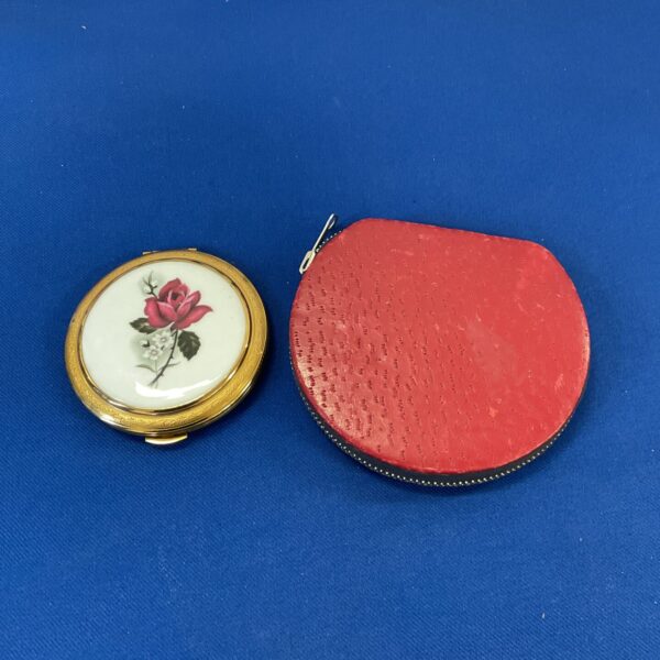 Vintage Kigu of London compact with floral design.