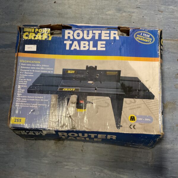Powercraft router table in original box, woodworking tool.