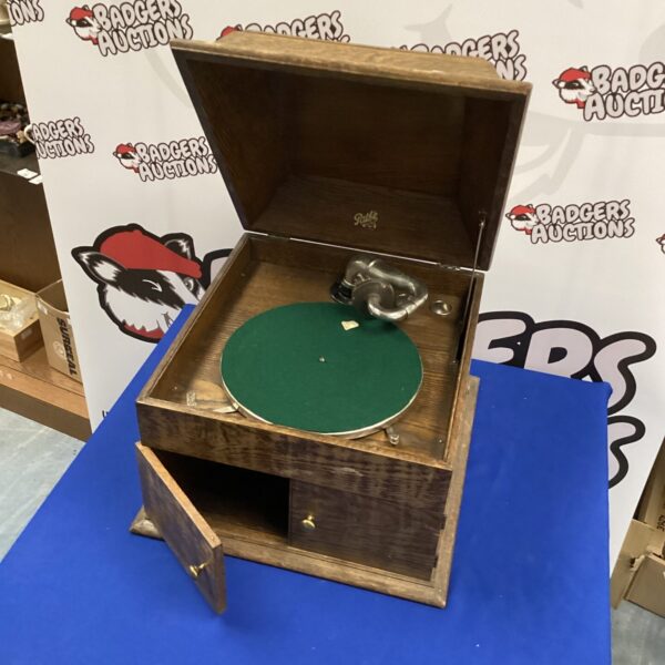 Vintage Pathé gramophone with wooden cabinet, a classic antique audio device.