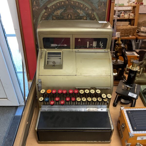 Ornate vintage National Cash Register, Model 312, antique store display.