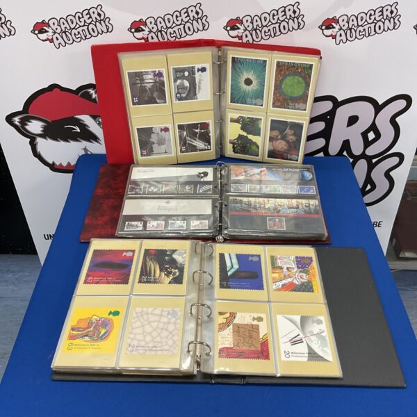 Vintage postcard and first day cover album collection for collectors.