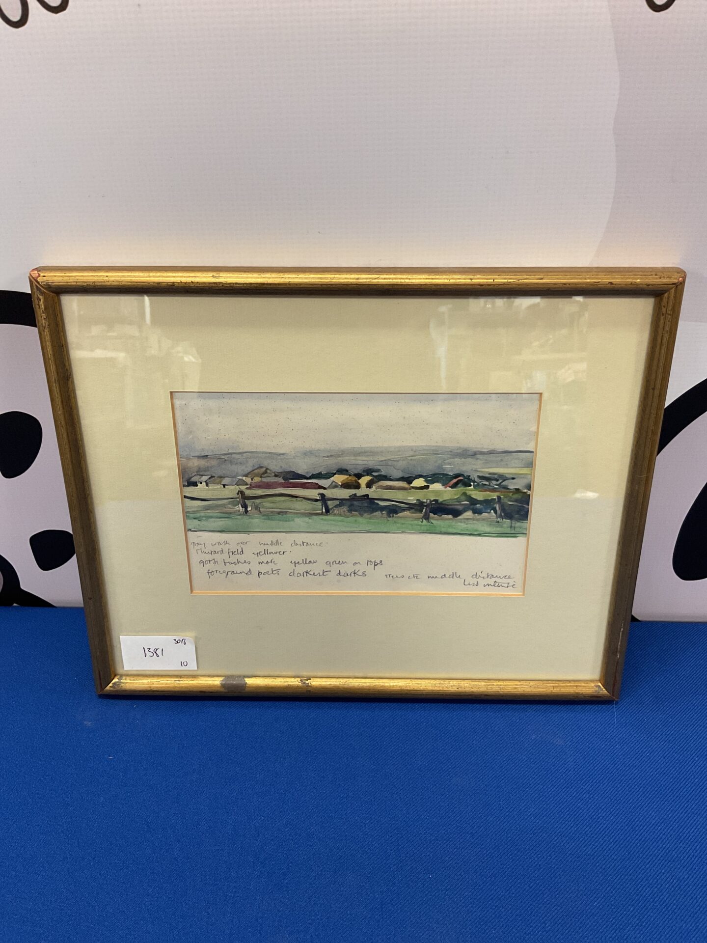 710 early 20th century watercolour of farm house on rolling hillside inscribed in pencil below