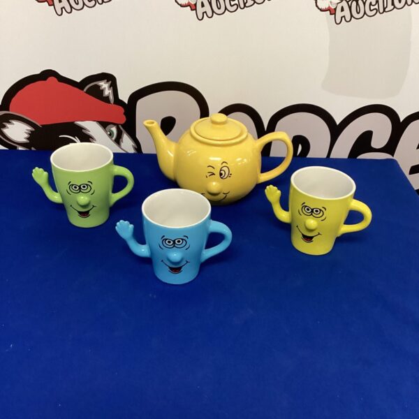Vintage Essence stoneware tea set with character mugs and teapot.