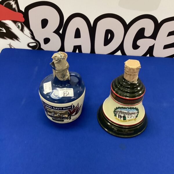 Pair of vintage Lambs and Bells pottery flagons for collectors.