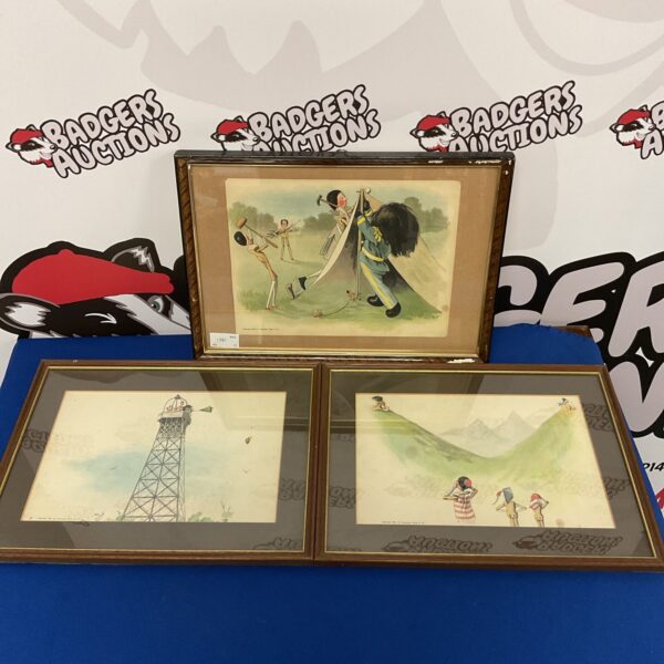 Antique Victorian prints of gollywogs and dollies in a playful scene.