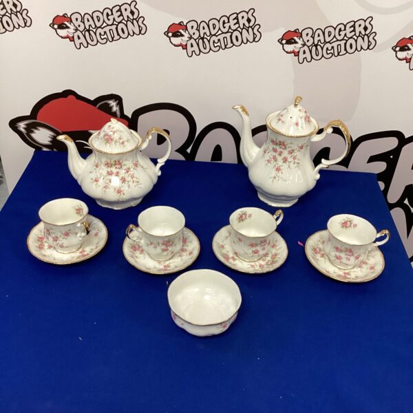 Vintage Paragon Victoriana Rose bone china tea set with floral design.