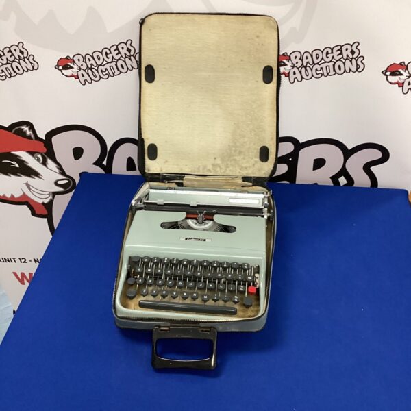 Vintage Olivetti Lettera 22 typewriter in blue.
