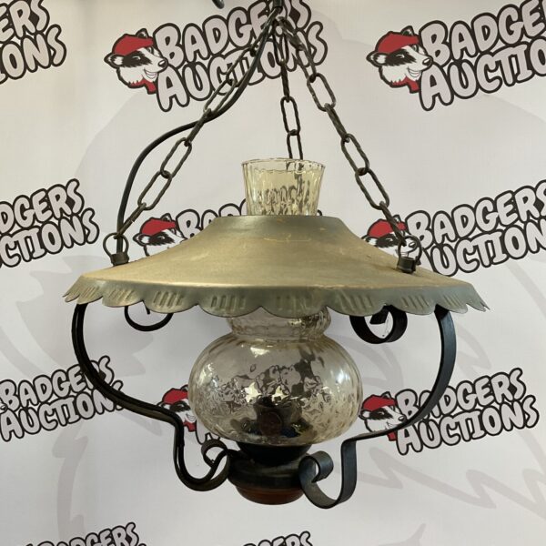 Vintage copper and iron ceiling light with frosted glass shade.
