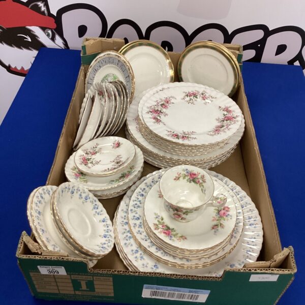 Large collection of vintage Royal Albert bone china with floral design.