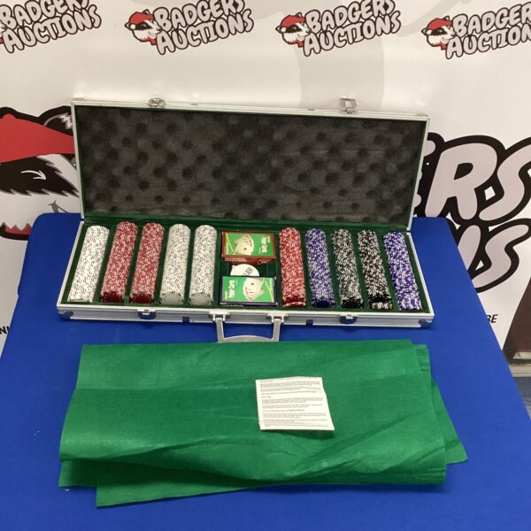 Open poker set in silver carry case with colourful chips.