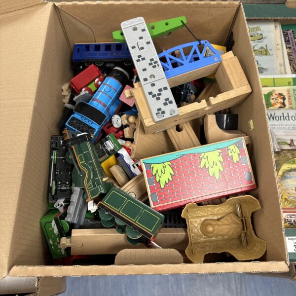 John Lewis wooden train set with colourful trains and track pieces.