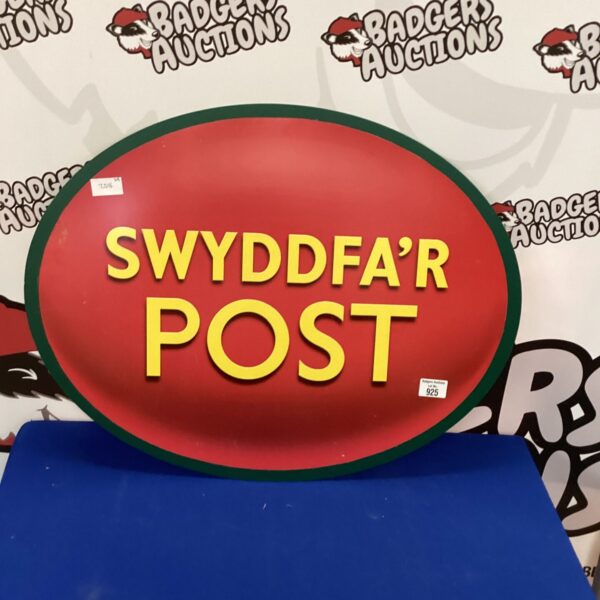 Vintage Welsh Post Office sign with bold lettering.