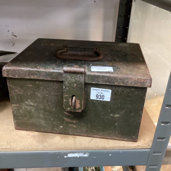 Vintage metal safety box with a locking mechanism and handle.