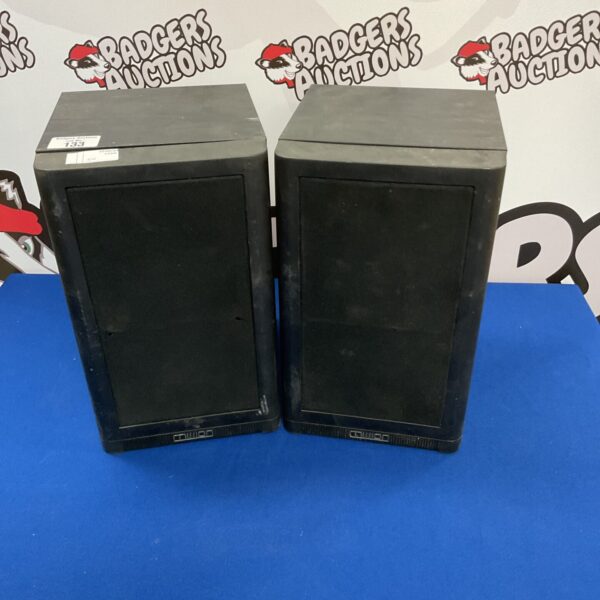 Pair of vintage Mission bookshelf speakers for home audio.