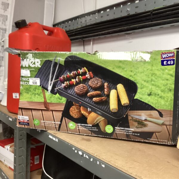 Black Tower BBQ grill with chrome cooking grid.