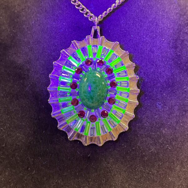 Vintage Swarovski uranium pendant necklace with glowing stones.