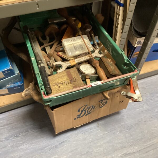 Vintage hand tools lot in a cardboard box, workshop collection.