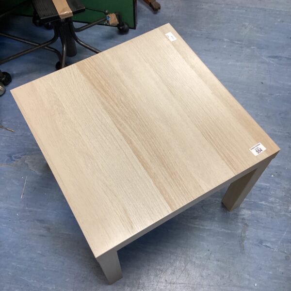 Modern small coffee table, 22 inch square, minimalist design.