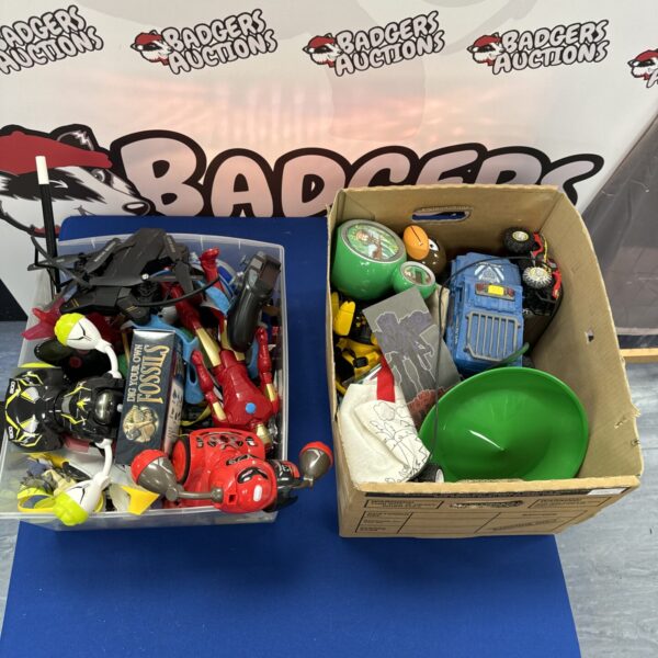 Assorted children’s toys including figures and play sets.