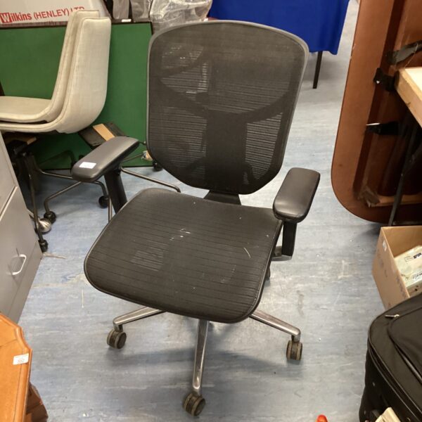 Black ergonomic office chair with mesh back and adjustable height.