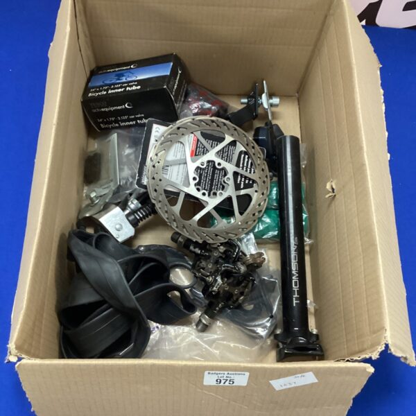 Bike spares lot including Shimano disc brakes and inner tube.