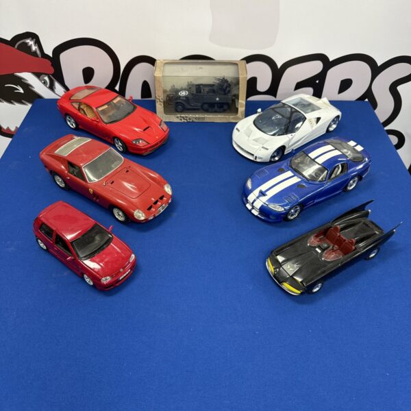Diverse collection of diecast model cars, including Maisto and Corgi.