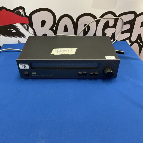 Vintage NAD AM/FM tuner, a classic stereo receiver for audio enthusiasts.